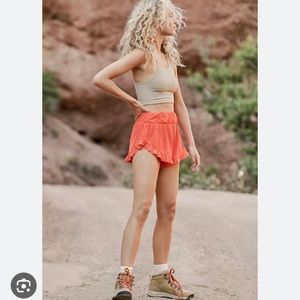 NWT Free People Movement Featherweight Layering Shorts Size M Color Papaya Punch